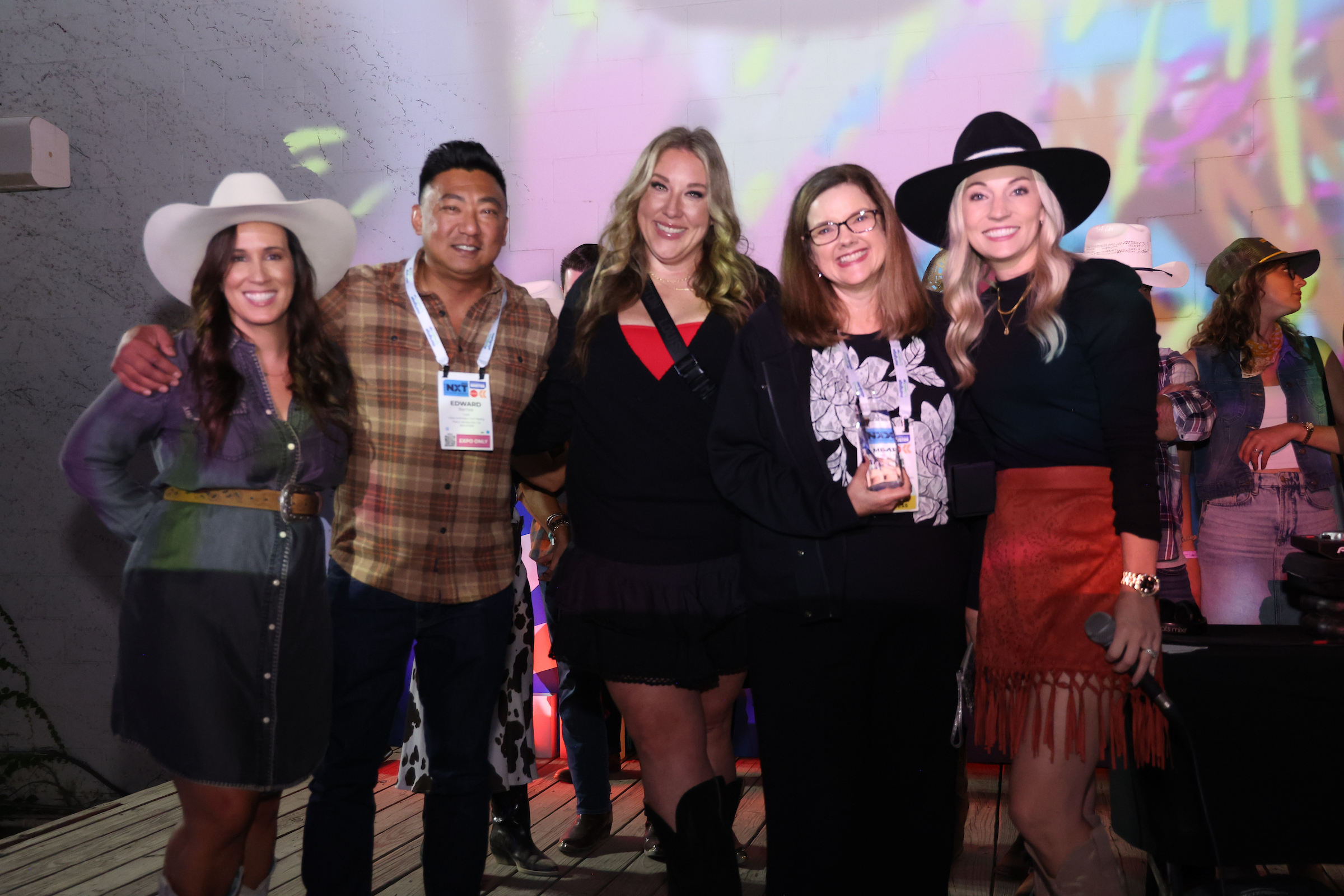 small group of ypn members holding an award