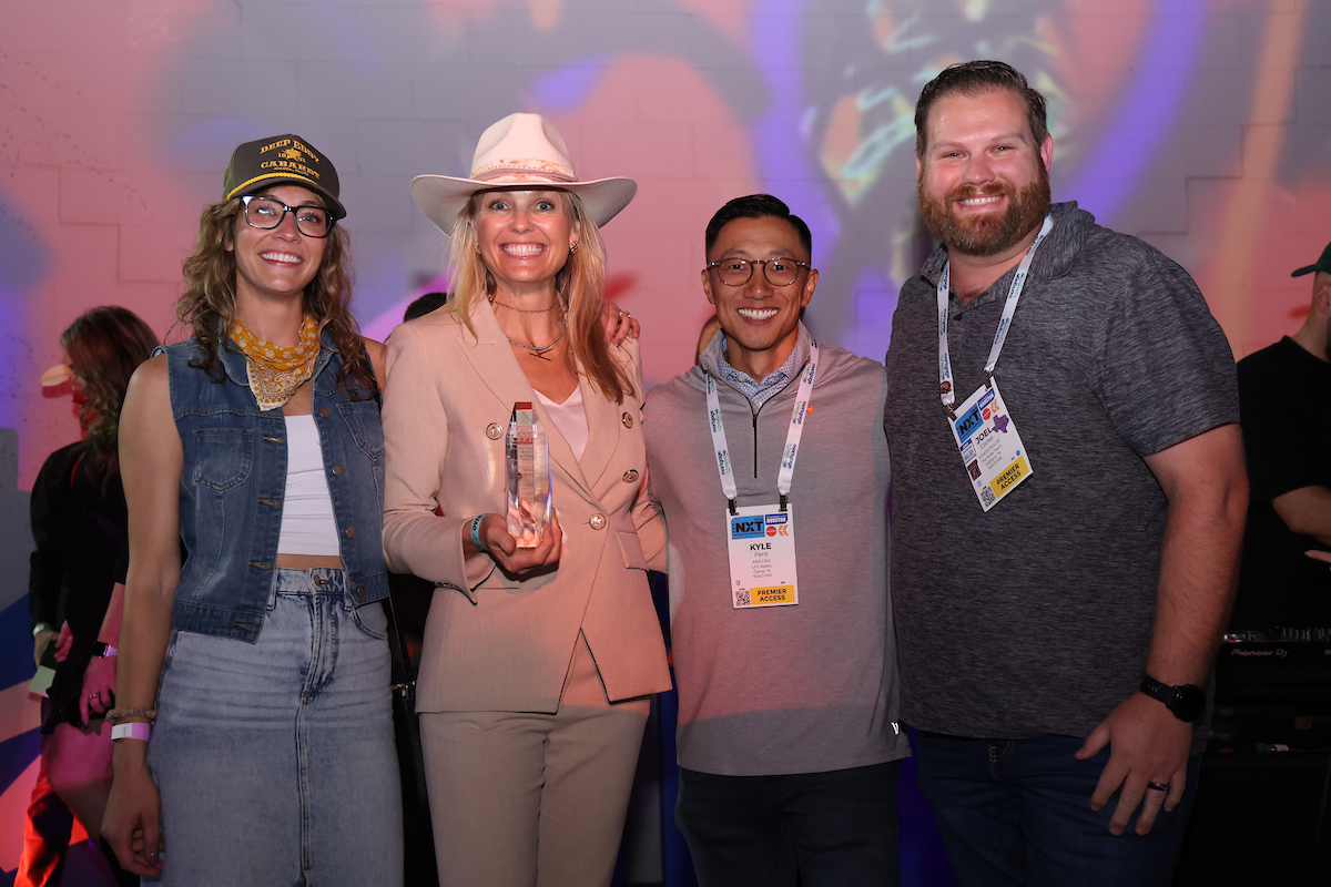 very large group of ypn members holding an award